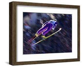 Blurred Action of Ski Jumper Flying Throught the Air-null-Framed Photographic Print