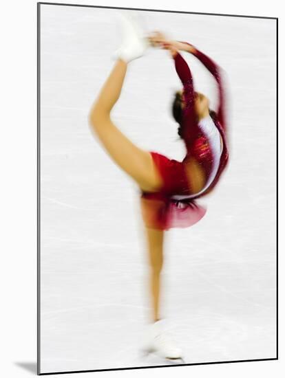 Blurred Action of Woman Figure Skater, Torino, Italy-Chris Trotman-Mounted Photographic Print