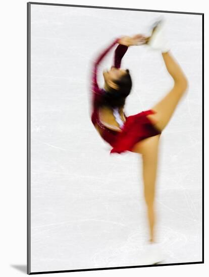 Blurred Action of Woman Figure Skater, Torino, Italy-Chris Trotman-Mounted Photographic Print