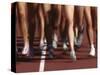 Blurred Action of Women Runners During a Track Race-Steven Sutton-Stretched Canvas