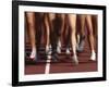 Blurred Action of Women Runners During a Track Race-Steven Sutton-Framed Photographic Print