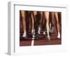 Blurred Action of Women Runners During a Track Race-Steven Sutton-Framed Photographic Print