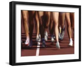 Blurred Action of Women Runners During a Track Race-Steven Sutton-Framed Photographic Print