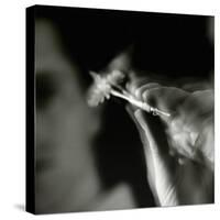 Blurred Image of a Man Aiming a Dart-null-Stretched Canvas