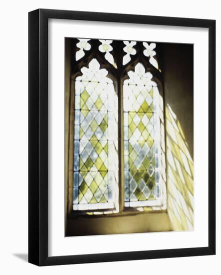 Blurred Image of a Stained Glass Window-null-Framed Premium Photographic Print