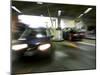 Blurred Image of Cars in a Parking Garage-null-Mounted Premium Photographic Print