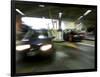 Blurred Image of Cars in a Parking Garage-null-Framed Photographic Print