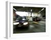 Blurred Image of Cars in a Parking Garage-null-Framed Photographic Print