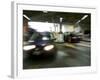 Blurred Image of Cars in a Parking Garage-null-Framed Photographic Print