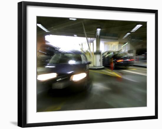 Blurred Image of Cars in a Parking Garage-null-Framed Photographic Print