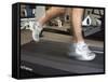 Blurred Image of Legs on a Treadmill-null-Framed Stretched Canvas