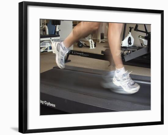 Blurred Image of Legs on a Treadmill-null-Framed Photographic Print