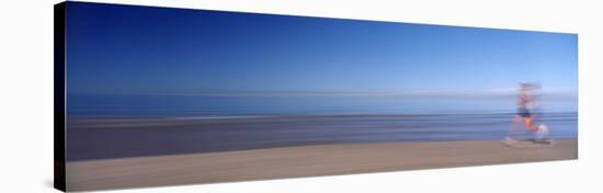 Blurred Motion, Side Profile of a Woman Running on the Beach-null-Stretched Canvas