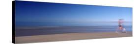 Blurred Motion, Side Profile of a Woman Running on the Beach-null-Stretched Canvas