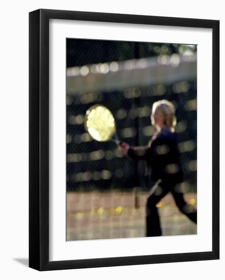 Blurry Image of a Girl Playing Tennis-null-Framed Photographic Print