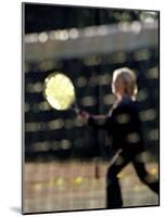 Blurry Image of a Girl Playing Tennis-null-Mounted Photographic Print