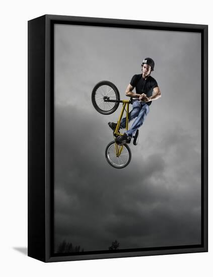 BMX Biker Performing Tricks-null-Framed Stretched Canvas