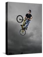 BMX Biker Performing Tricks-null-Stretched Canvas