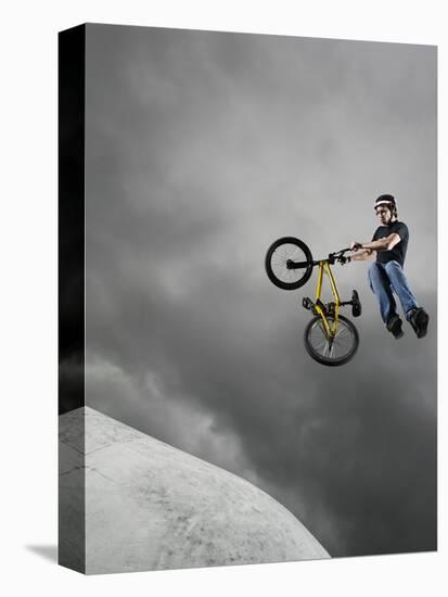 BMX Biker Performing Tricks-null-Stretched Canvas