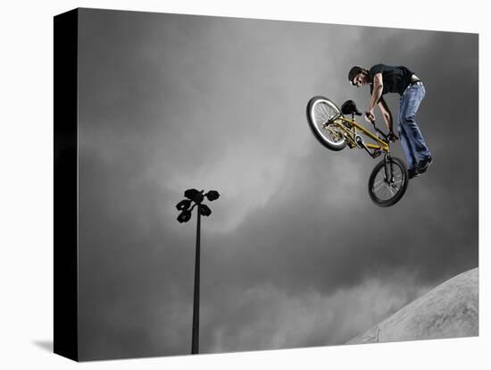 BMX Biker Performing Tricks-null-Stretched Canvas