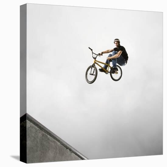 BMX Biker Performing Tricks-null-Stretched Canvas