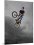 BMX Biker Performing Tricks-null-Mounted Photographic Print