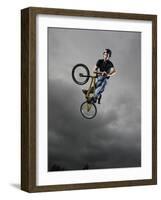 BMX Biker Performing Tricks-null-Framed Photographic Print