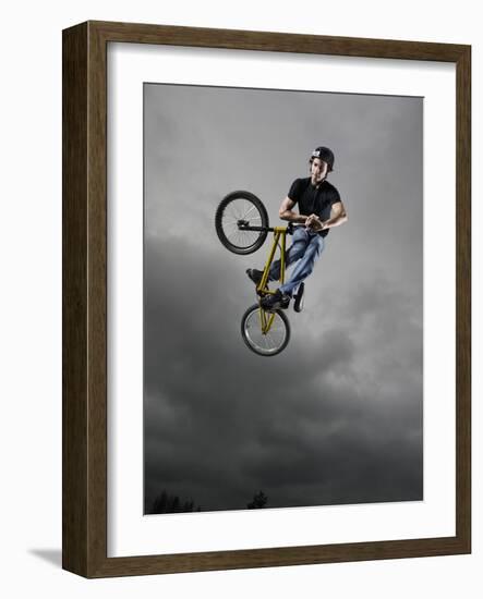 BMX Biker Performing Tricks-null-Framed Photographic Print