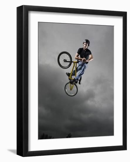 BMX Biker Performing Tricks-null-Framed Photographic Print