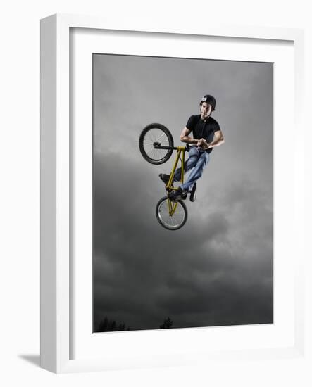 BMX Biker Performing Tricks-null-Framed Photographic Print