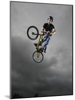 BMX Biker Performing Tricks-null-Mounted Photographic Print