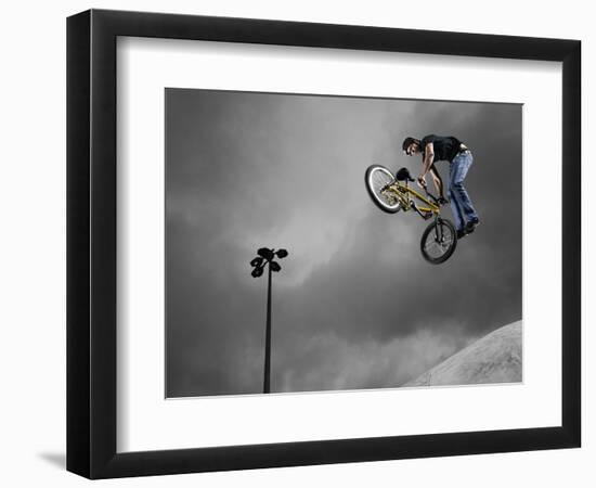 BMX Biker Performing Tricks-null-Framed Photographic Print