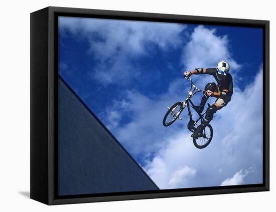 Bmx Cyclist Flys over the Vert-null-Framed Stretched Canvas