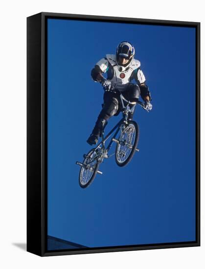 Bmx Cyclist Flys over the Vert-null-Framed Stretched Canvas