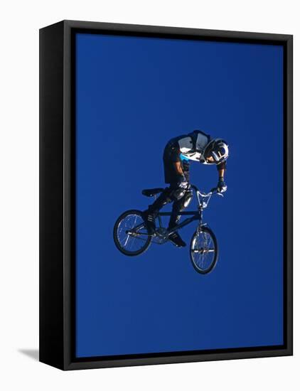 Bmx Cyclist Flys over the Vert-null-Framed Stretched Canvas