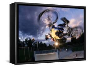 Bmx Cyclist Flys over the Vert-null-Framed Stretched Canvas