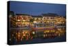 Boat and restaurants reflected in Thu Bon River at dusk, Hoi An, Vietnam-David Wall-Stretched Canvas