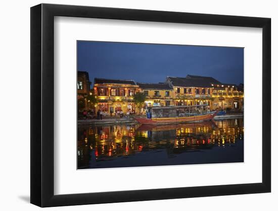 Boat and restaurants reflected in Thu Bon River at dusk, Hoi An, Vietnam-David Wall-Framed Photographic Print