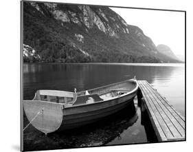 Boat at Lake Pier-null-Mounted Art Print