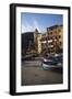 Boat at Sunset in Front of Apartment Building-David Barnes-Framed Photographic Print