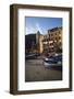 Boat at Sunset in Front of Apartment Building-David Barnes-Framed Photographic Print