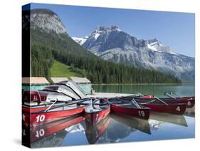 Boat Dock and Canoes for Rent on Emerald Lake, Yoho National Park,British Columbia-Howard Newcomb-Stretched Canvas