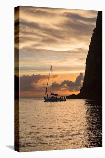 Boat moored at the base of Petit Piton near Sugar Beach at dusk, St. Lucia, Windward Islands, West-Martin Child-Stretched Canvas