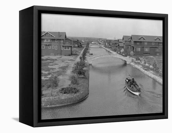 Boat on Aldebaran Canal Passing Houses in Venice, California-null-Framed Stretched Canvas