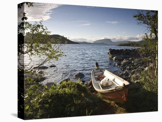 Boat on Lake Kilpisjarvi, Kilpisjarvi, Arctic Circle, Lapland, Finland-Doug Pearson-Stretched Canvas