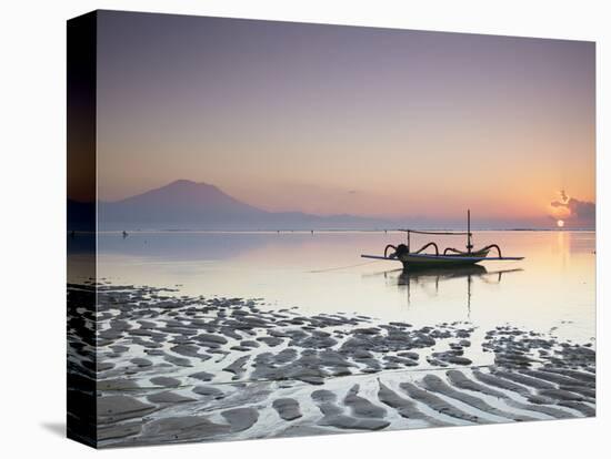 Boat on Sanur Beach at Dawn, Bali, Indonesia-Ian Trower-Stretched Canvas