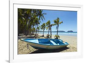 Boat on the Palm-Fringed Beach at This Laid-Back Village and Resort-Rob Francis-Framed Photographic Print