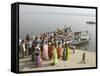 Boat on the River Ganges While a Cremation Takes Place, Varanasi, Uttar Pradesh State, India-Tony Waltham-Framed Stretched Canvas