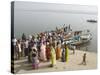 Boat on the River Ganges While a Cremation Takes Place, Varanasi, Uttar Pradesh State, India-Tony Waltham-Stretched Canvas