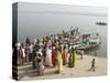 Boat on the River Ganges While a Cremation Takes Place, Varanasi, Uttar Pradesh State, India-Tony Waltham-Stretched Canvas